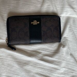 Signature coated canvas zip around wallet